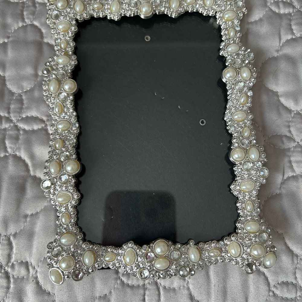 Silver Tone picture frame embellished with faux pearls and rhinestones.
